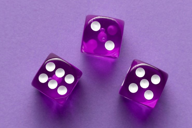 Galactic Gems slot game with cosmic purple background and neon symbols