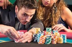 Live dealer table with host and player chat sidebar